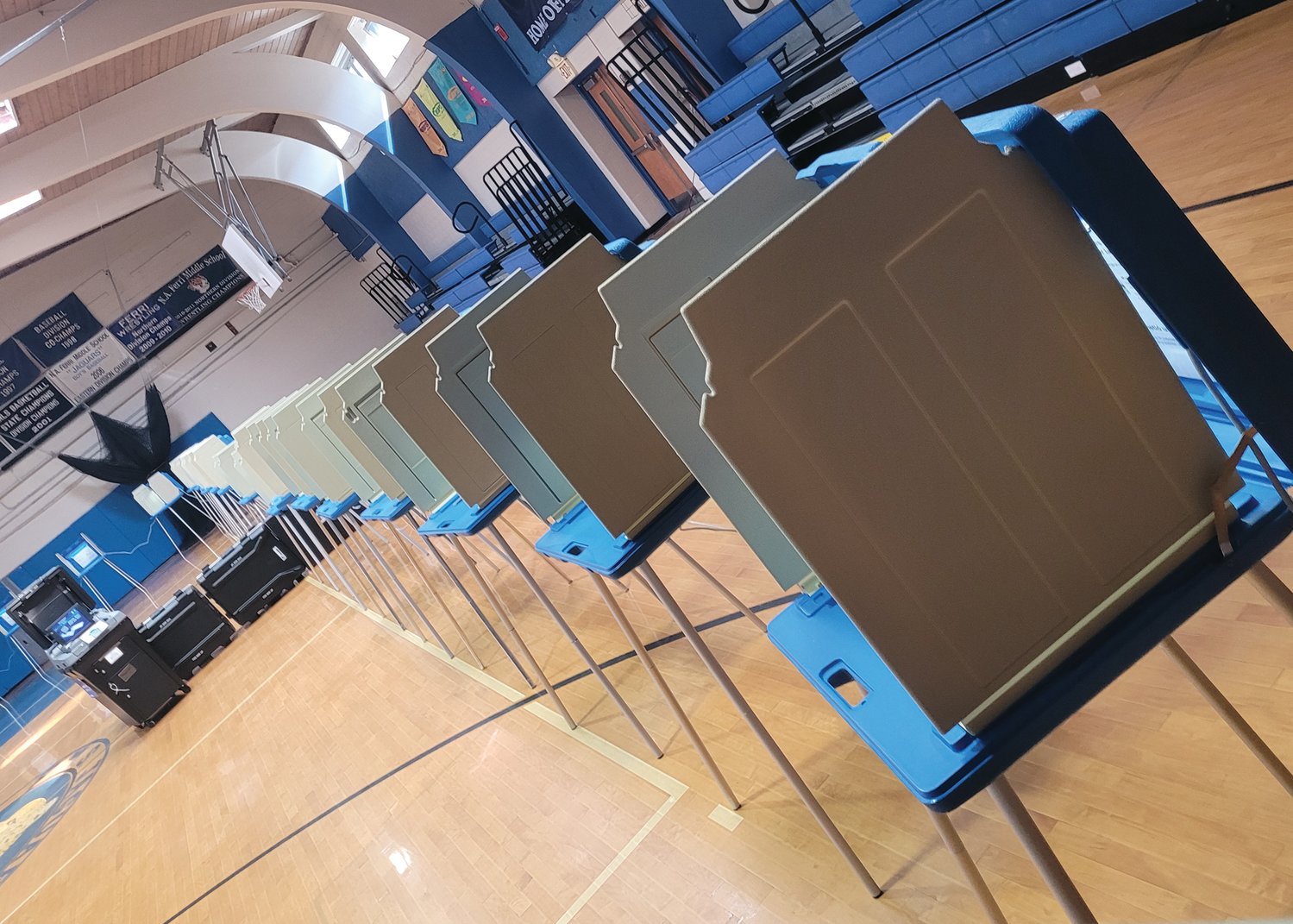 LONELY POLLS: A long row of lonely voting boots sat empty most of the day Tuesday. Only slightly more than 5 percent of Johnston’s nearly 24,000 registered voters turned out to cast ballots.